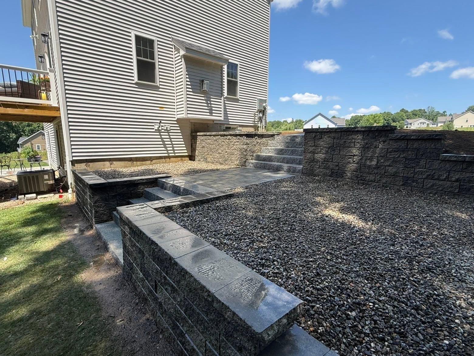Retaining wall finished — East Brookfield, MA property restored